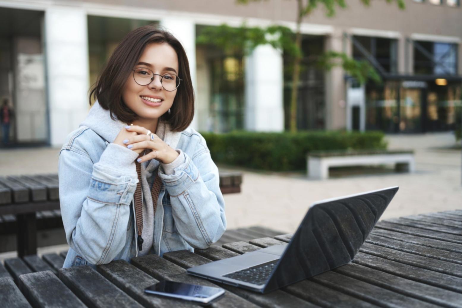 Financial education instructor working with students in a professional learning environment